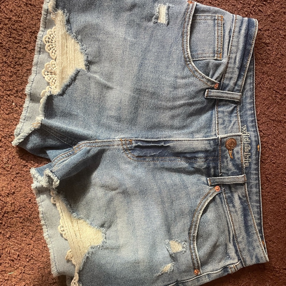 Ripped jean shorts